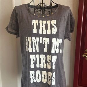 Gray Graphic Tee with White Text “This Ain’t My First Rodeo”